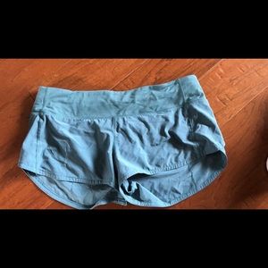 A light blue/greenish Lululemon shorts.